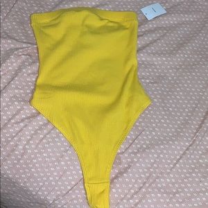 Yellow bodysuit